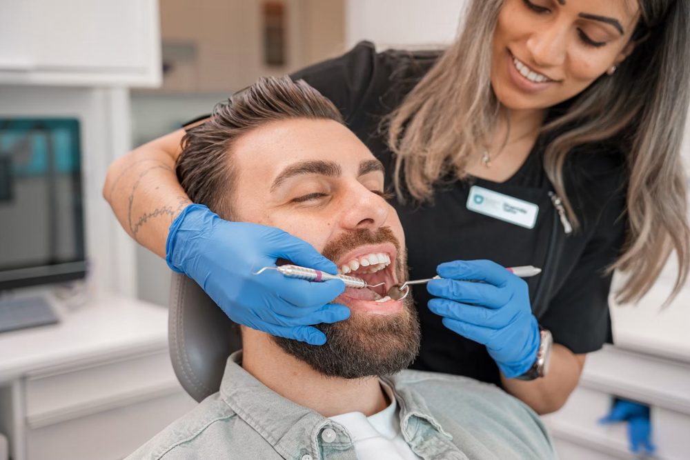 Smiling patient during a biological hygiene visit